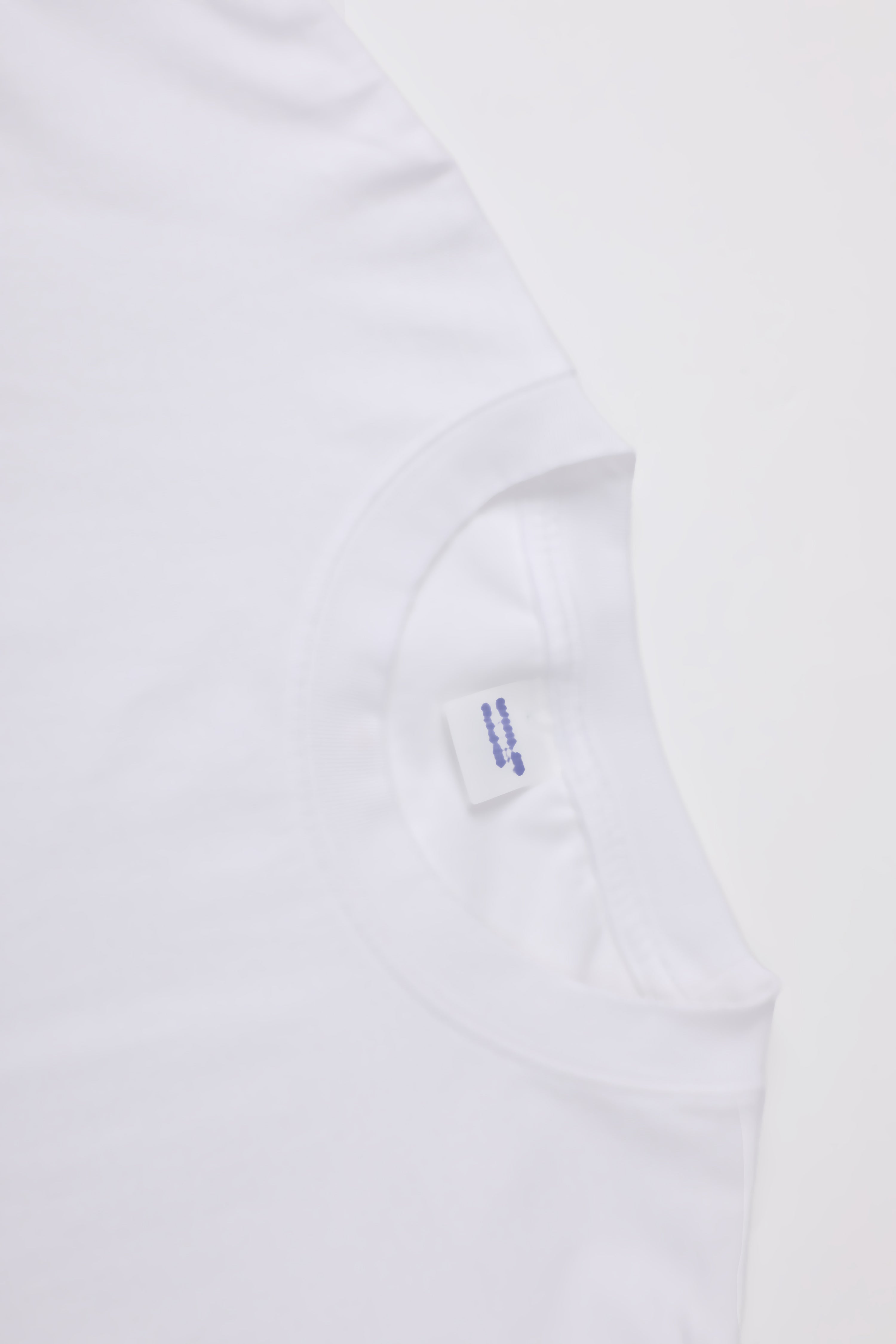 【綿100%】長袖 ポケットTシャツ | 肌触りの良い ホワイトで温もりのある ルーズフィット